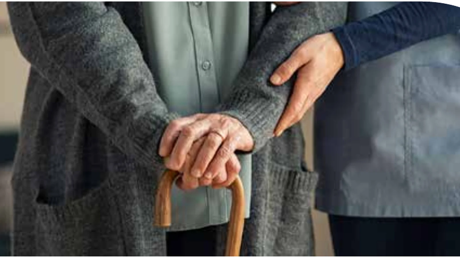 Illustrative visual representing an aged-care resident supported by a care professional